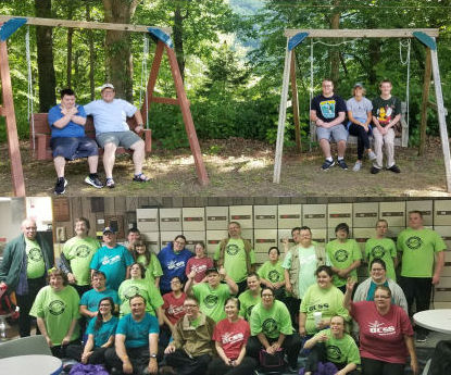 consumers getting their picture taken in front of places they visited